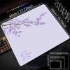 A purple cherry blossom themed non-slip gaming mouse pad with dimensions 45cm x 40cm.