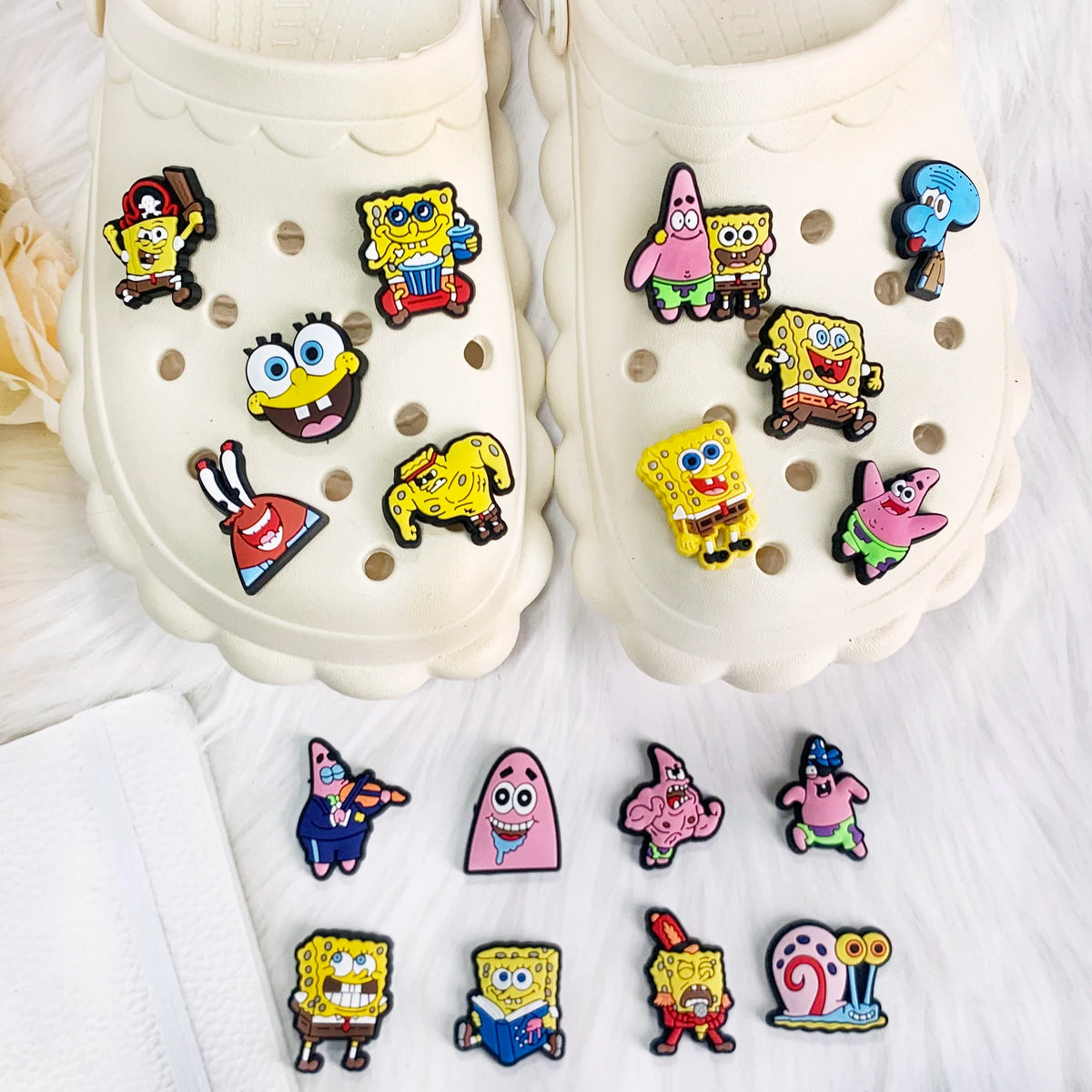A set of SpongeBob SquarePants themed shoe charms featuring various characters and shapes.