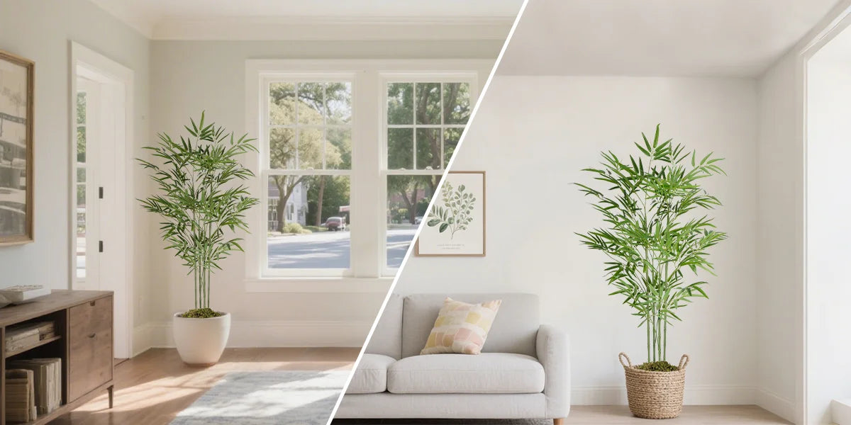 A realistic faux bamboo tree in a pot displayed indoors next to a window and a sofa.