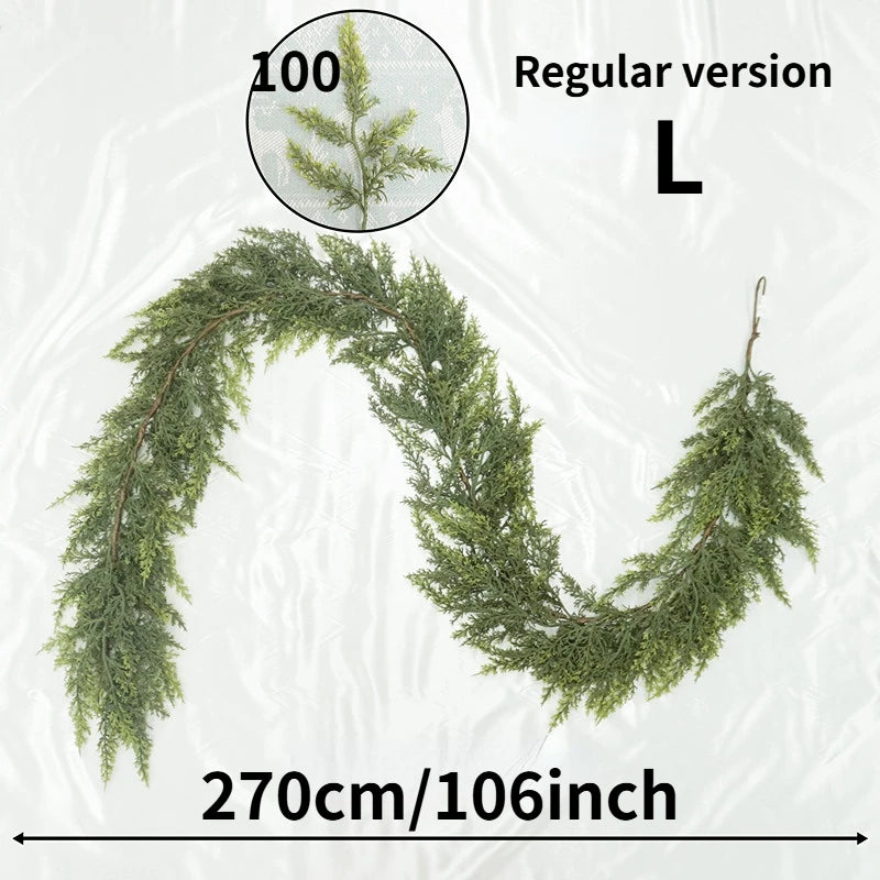 A long, natural green cedar garland shaped like a 'L' curve, measuring 270cm or 106 inches.