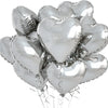 A bunch of silver heart-shaped foil balloons tied together with strings.