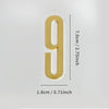 A polished gold house number 9 with a self-adhesive backing, measuring 7.0cm or 2.75 inches tall.