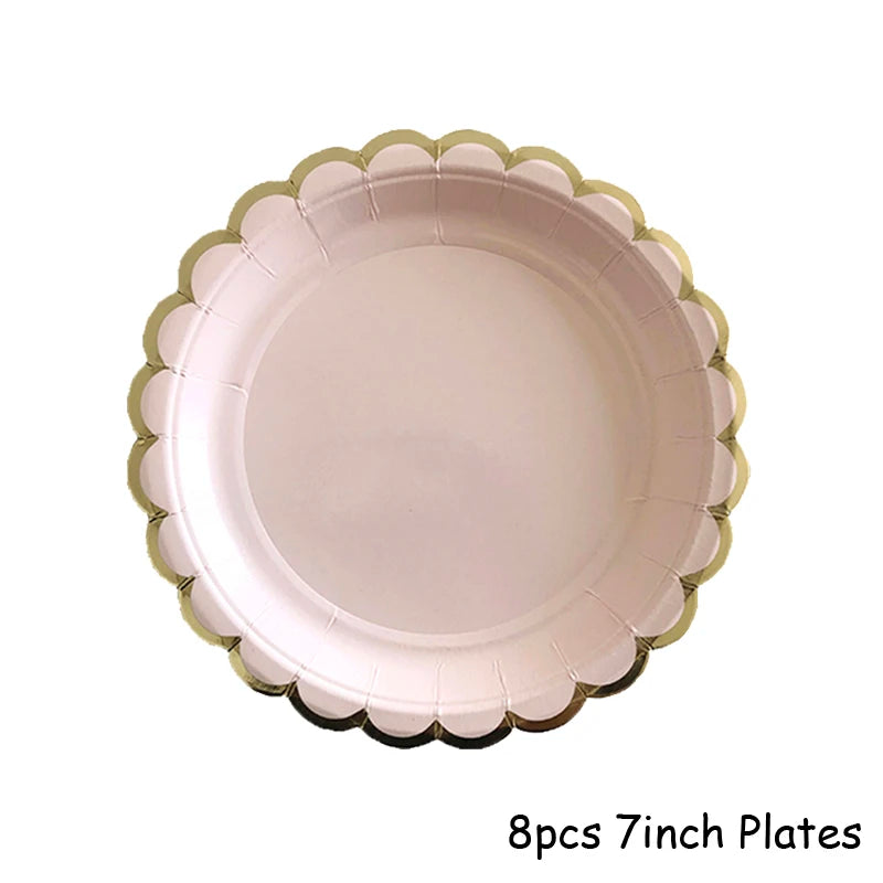 Eight 7-inch pink plates with gold scalloped edges for a disposable party set
