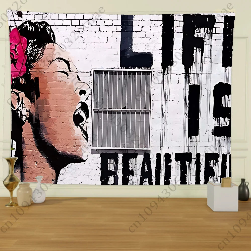 A black and white street graffiti art tapestry featuring a woman's profile and the text LIFE IS BEAUTIFUL on a brick backgrou