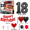 A set of red and black birthday balloons including a 32-inch number balloon, heart balloons, and solid colored balloons.