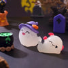 A set of seven cute luminous ghost resin ornaments, including a purple hat and a white ghost figure.