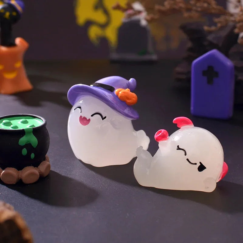 A set of seven cute luminous ghost resin ornaments, including a purple hat and a white ghost figure.
