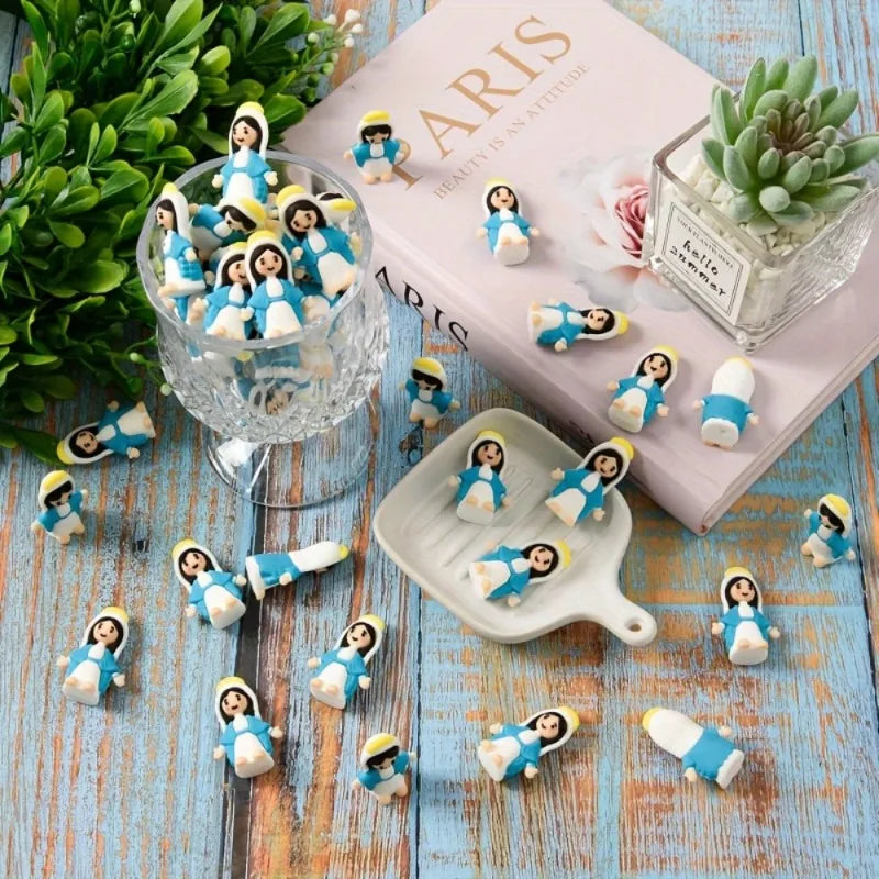 A collection of twenty classic blue and white mini figurines arranged on a wooden surface next to a pink box.
