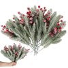 A sprig of frosted pine needles with red berries used as a Christmas bouquet