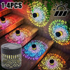 Four solar-powered mandala wall lanterns illuminating a wooden deck and garden area.