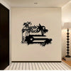 A black silhouette wall hanging featuring the text Puerto Rico and palm trees on a light-colored wall.