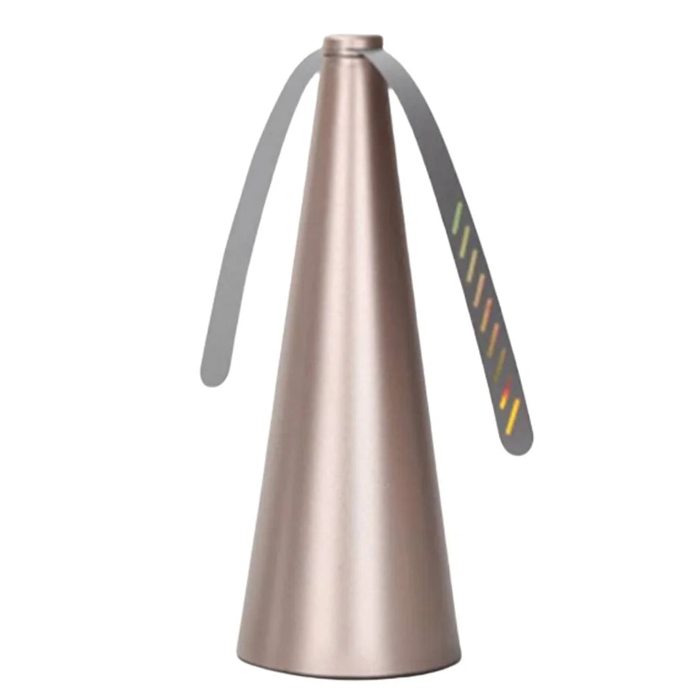 A rose gold automatic electric fly repellent fan with a curved metal guard.