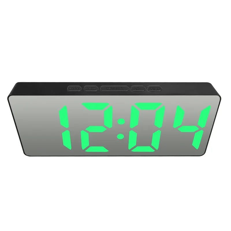 A rectangular digital alarm clock displaying the time 12:04 with bright green LED digits.