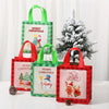 A set of festive Christmas non-woven gift tote bags in red, green, and pink featuring holiday prints and plaid patterns.