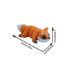 An orange and white cartoon animal figurine, likely a fox or similar creature, shown in profile with dimensions provided.