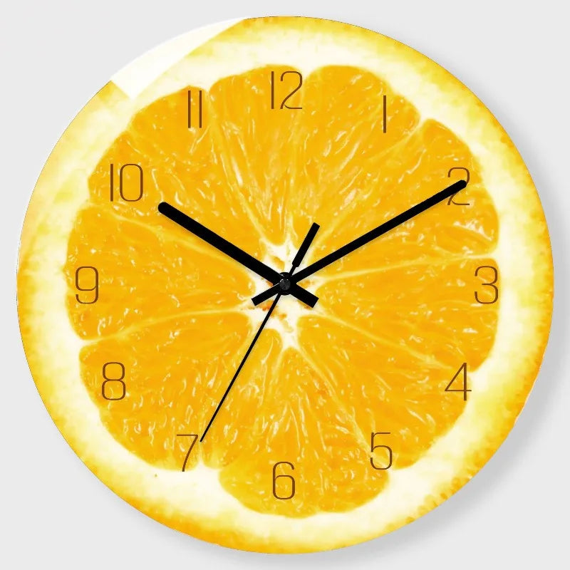 A round clock face designed like a sliced orange, showing the time.