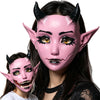 A woman is modeling a pink horned fantasy creature mask with a movable jaw.