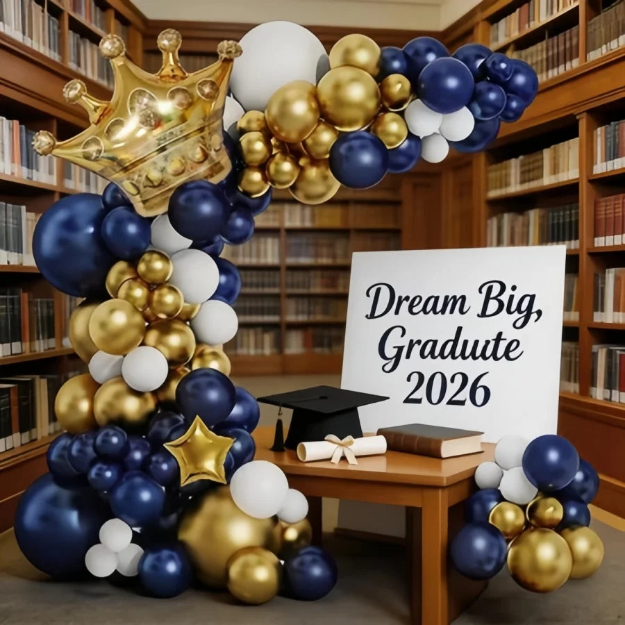 A balloon arch kit featuring navy blue, white, and gold balloons arranged in a crown shape.