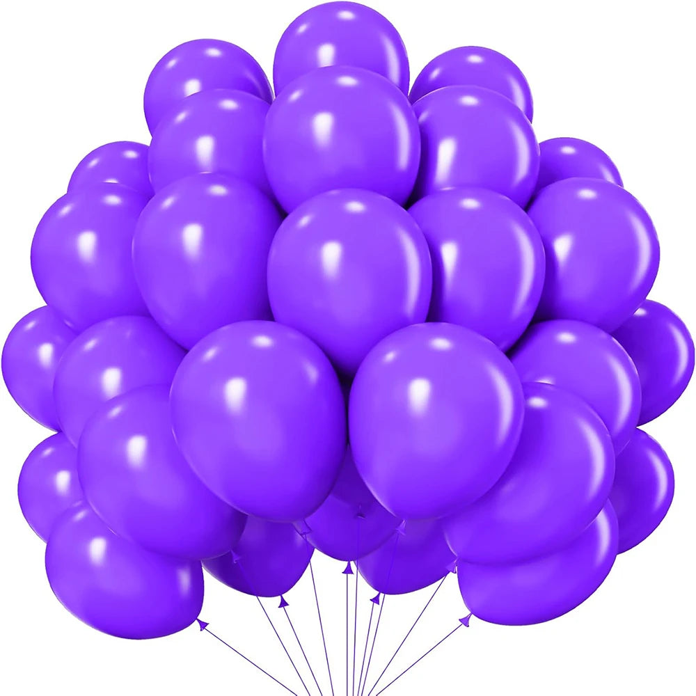 A bunch of purple latex balloons tied together, ready for a party.