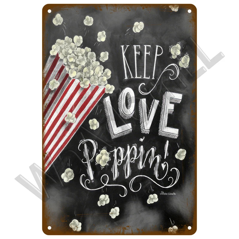 A rustic metal plaque featuring text that reads Keep Love Pippin surrounded by small white floral elements.
