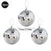 Three silver disco mirror balls with hanging loops for parties and decor
