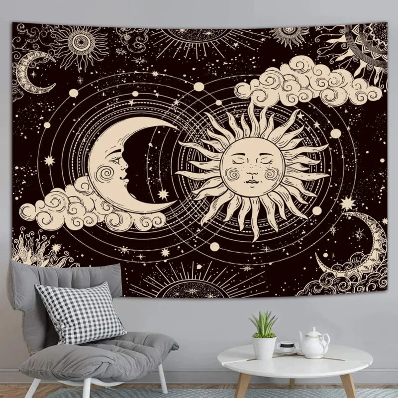 A dark tapestry wall hanging featuring a celestial design with a crescent moon and a sun surrounded by stars and clouds.
