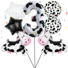 A set of large inflatable number balloons shaped like the number 3 and various cow print balloons for a party