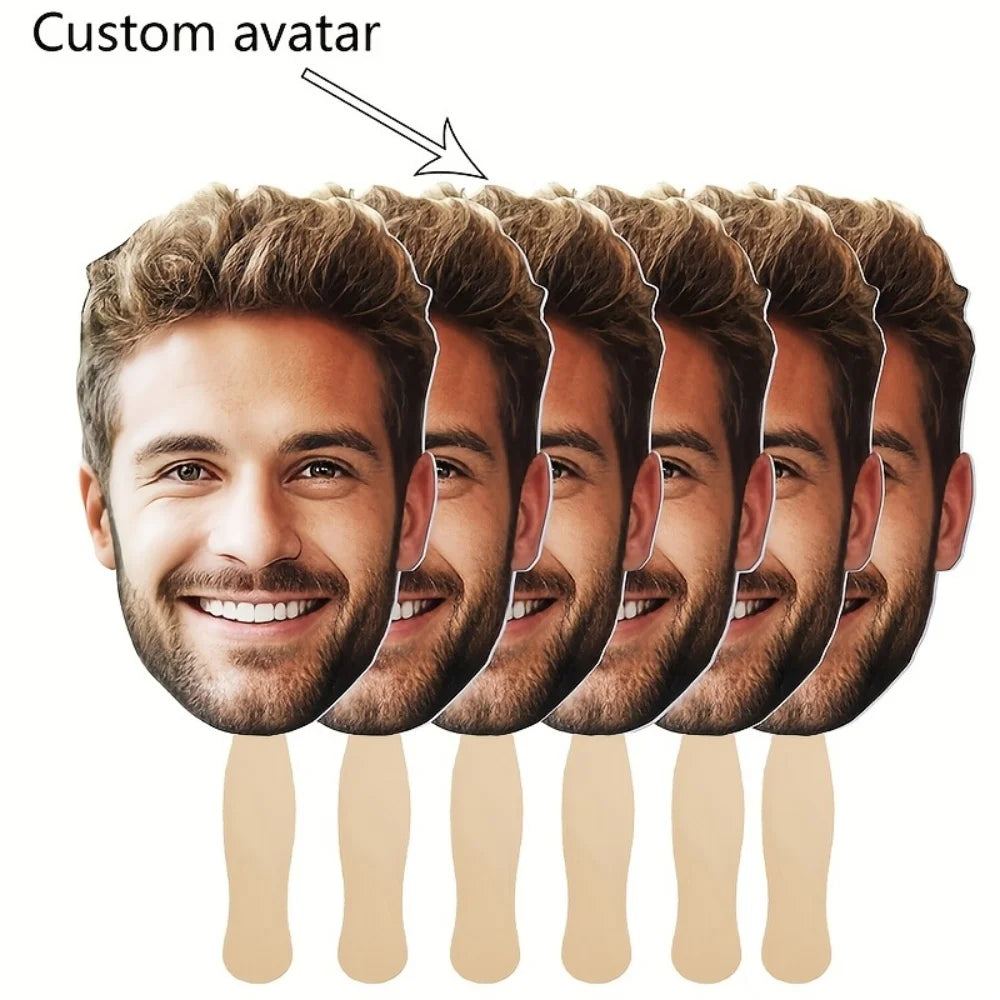 A row of custom face photo props on sticks showing various male faces for personalized party fans.