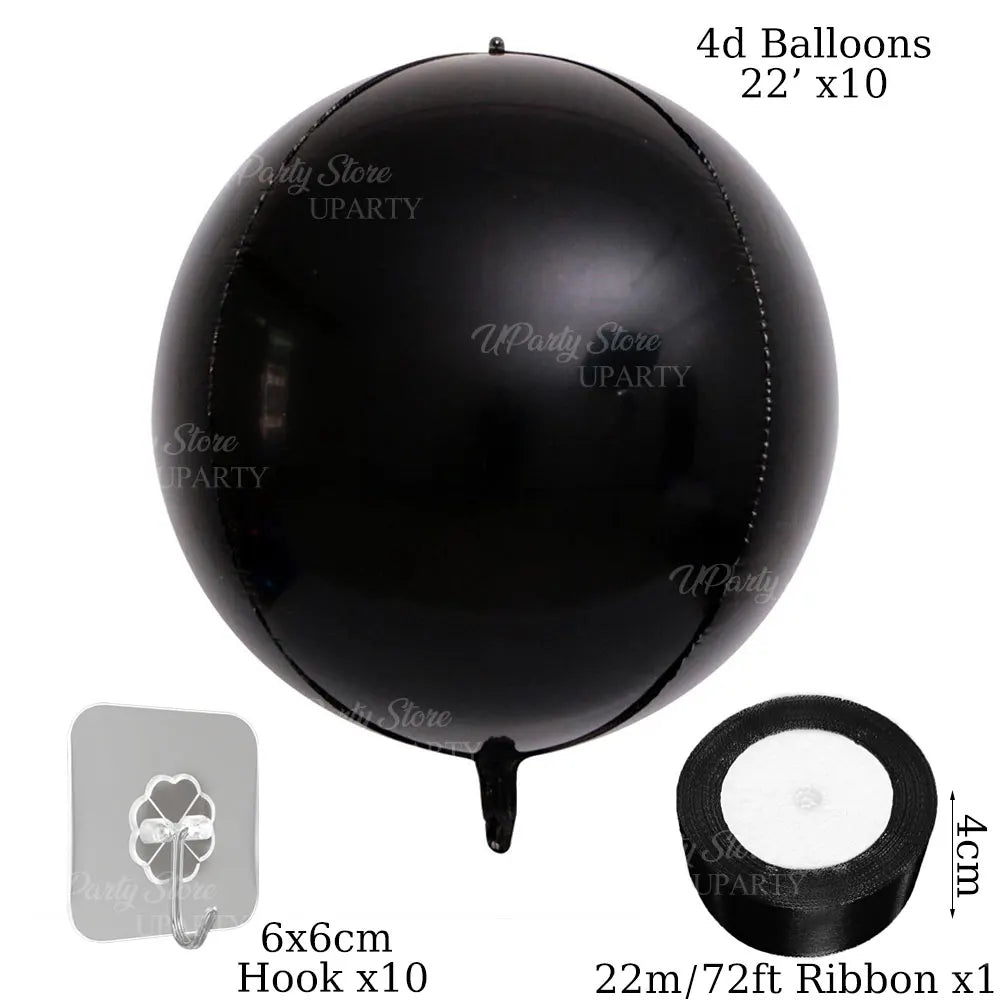 A black round 4D balloon is shown with a hook and a ribbon roll for party decoration.