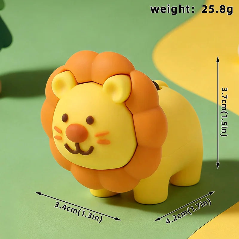 A yellow lion-themed cake topper with an orange mane, shown against a light green background.