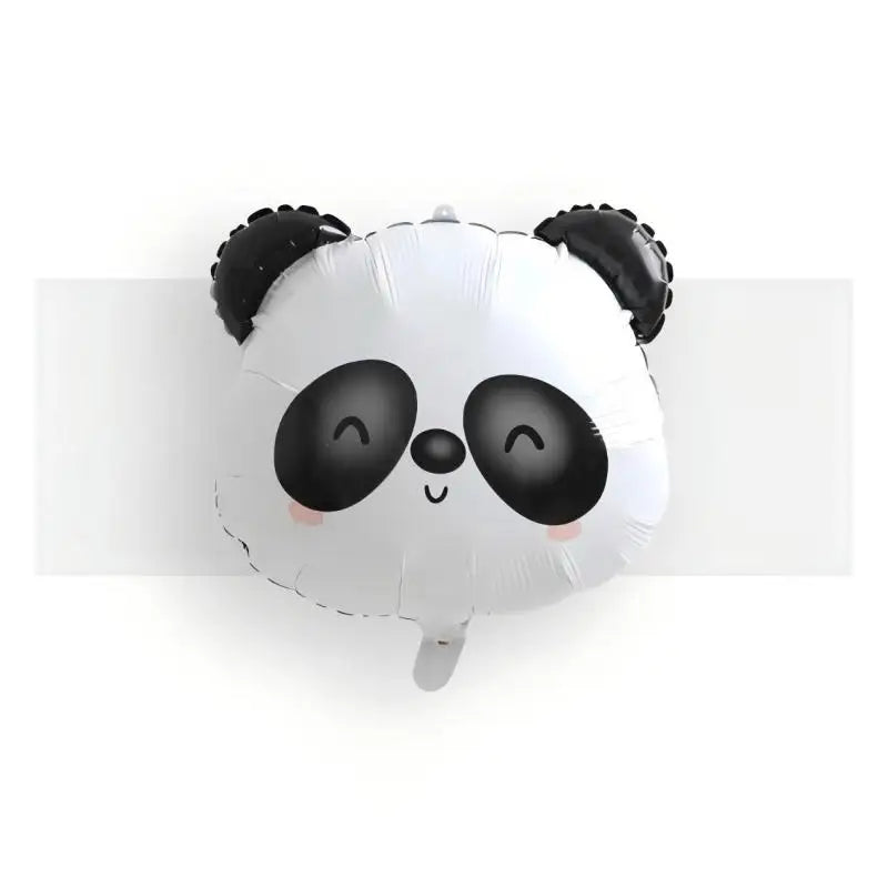 A white foil balloon shaped like a panda face with black ears and eyes for birthday decor.