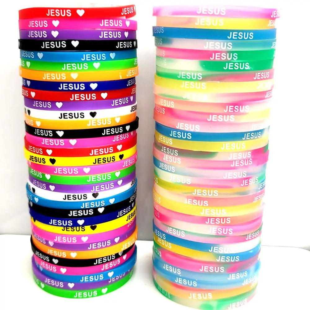 A stack of colorful silicone bracelets featuring the Jesus heart design in various shades of pink, blue, yellow, and green.