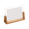 Walnut wood and acrylic photo frame with a clear glass display for desktop viewing