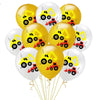A bunch of yellow and white latex balloons shaped like construction tractors and excavators.