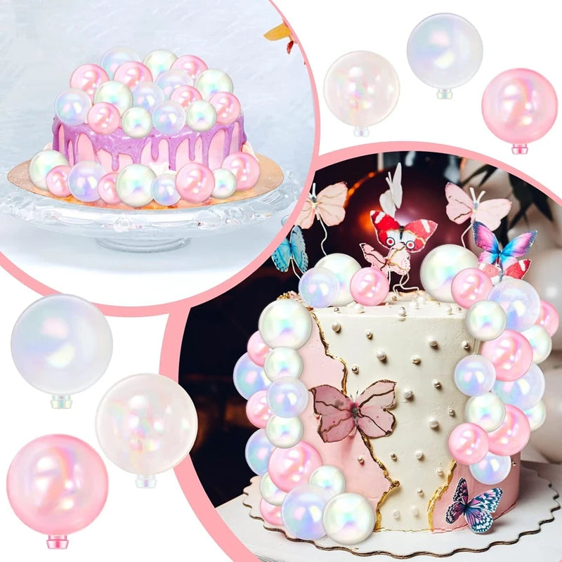 A tiered white cake decorated with pink and purple balloons and butterfly toppers on a stand.