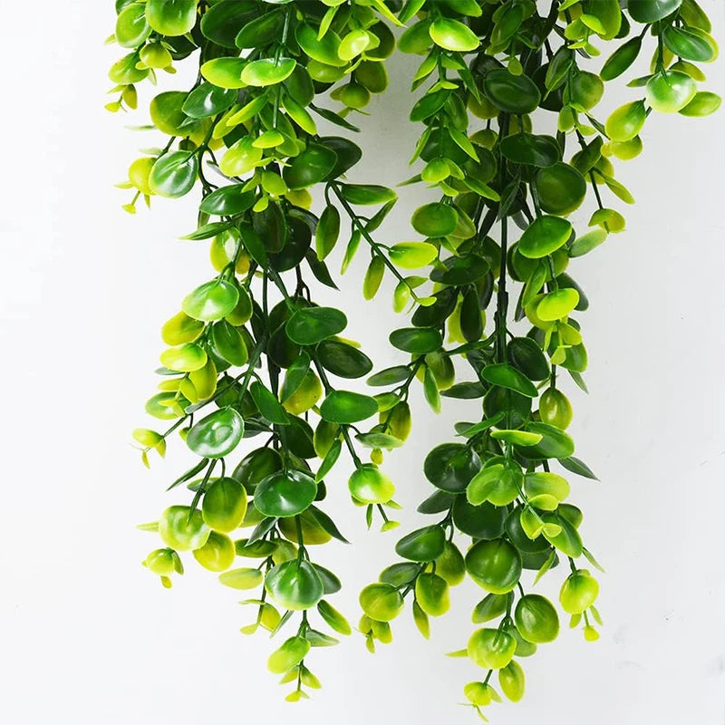 Green artificial eucalyptus hanging plants with oval leaves used for home decor