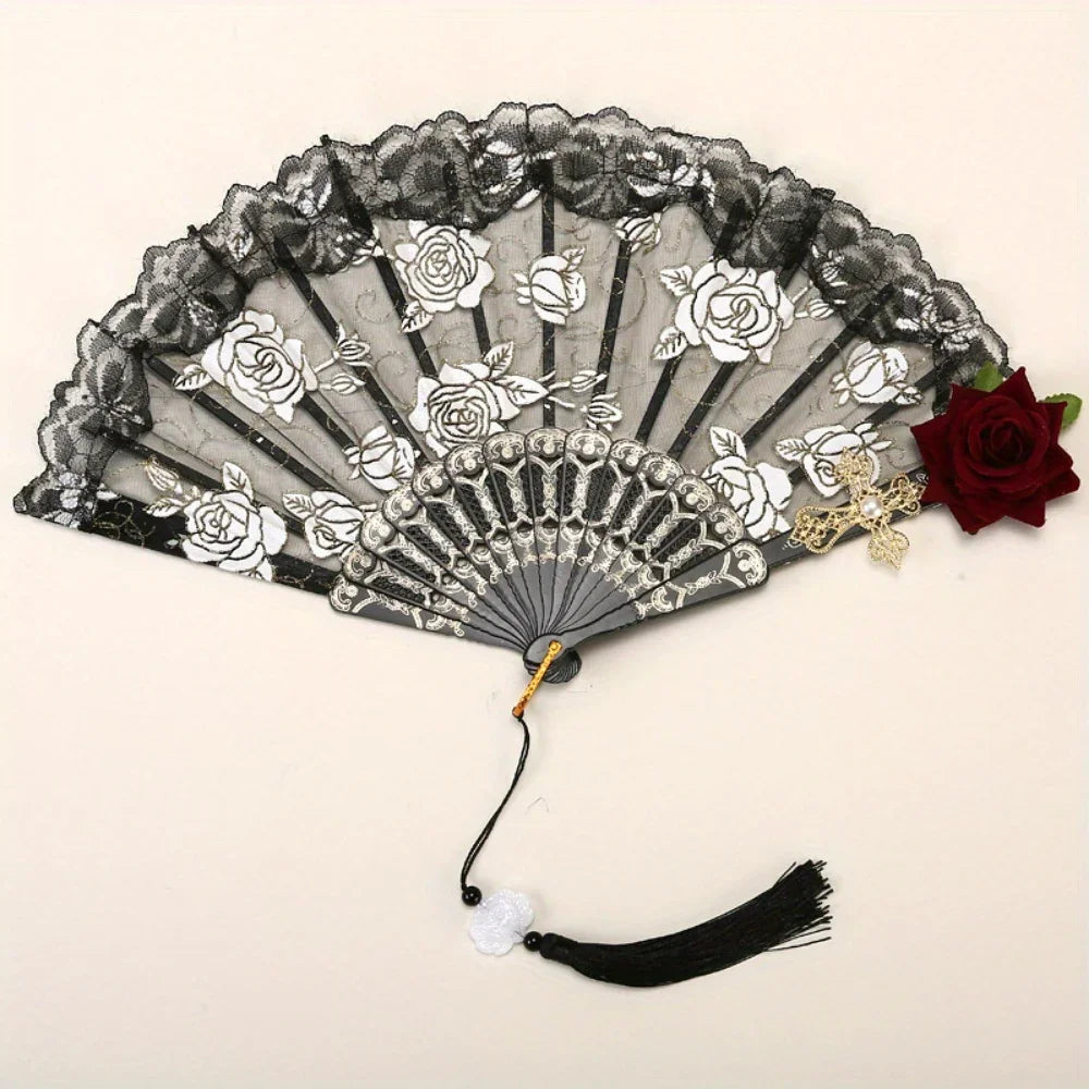 Vintage flamenco rose handheld folding fan with black and white floral patterns