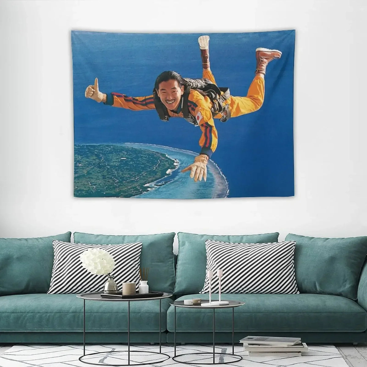 A vibrant tapestry featuring a man with long hair and yellow clothing making a thumbs-up gesture against a blue ocean backgro