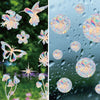 Rainbow suncatcher window stickers featuring colorful cat and butterfly designs on glass