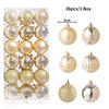 A box containing 36 gold and silver Christmas tree ornament balls, some of which are displayed individually.
