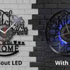 A comparison of a vintage vinyl record wall clock without LED and with LED versions mounted on a brick wall.