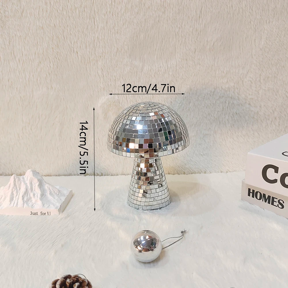 Silver mushroom-shaped disco ball decoration with a mirrored dome and pedestal stand