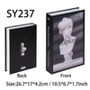 A black book titled Sculptures shows a white marble bust on the cover and back.