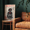 A vintage Japanese music poster featuring a record melting effect on canvas art displayed next to a leather armchair.