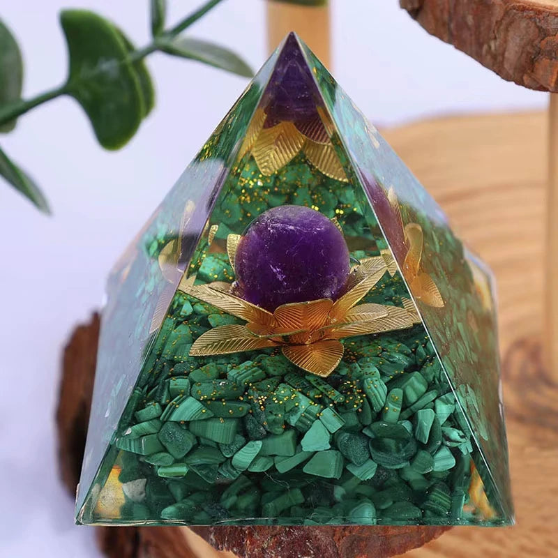 Handmade resin orgonite pyramid with natural green obsidian and gold copper coil crystals