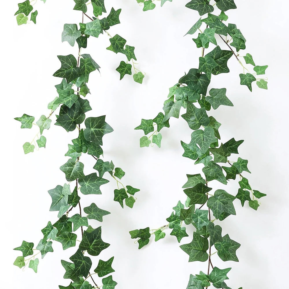 Green artificial ivy garland trailing down, used for home decor.