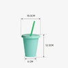 A light mint green plastic cold cup with a lid and a green straw, shown from the side.