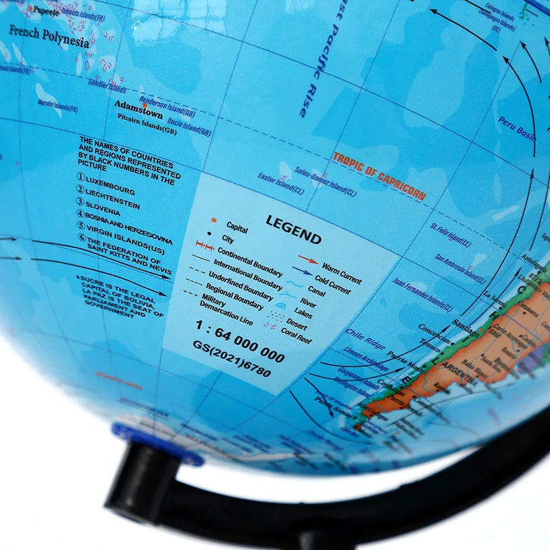 A desktop educational globe showing the world map with political boundaries and geographical features.