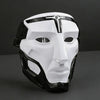 A white and black tactical warden cosplay mask with a prominent forehead emblem.
