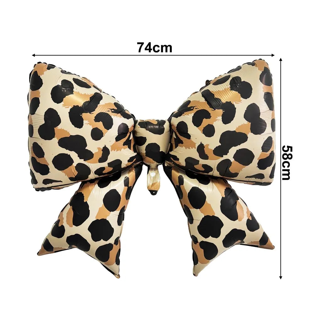 A set of leopard print foil balloons featuring black and tan spots, measuring 74cm in length.